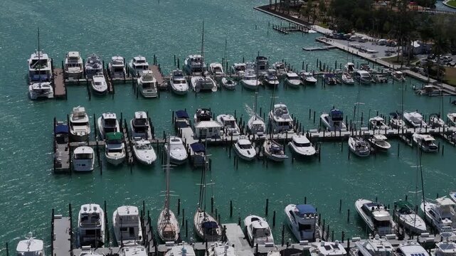 Longboat Key, United States - 13 July 2026: Aerial view of numerous yachts and motorboats docked at the marina in Florida.