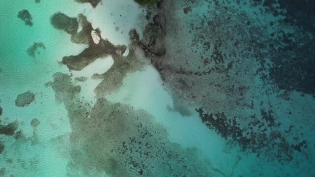Los Roques, Venezuela - 12 January 2025: Aerial view of the turquoise waters and coral reefs of the Los Roques archipelago.