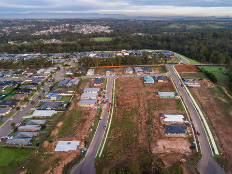New houses under construction in suburb at edge of town in Hunter Valley Australia