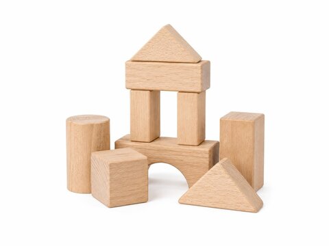 Wooden blocks arranged as house shape on white background