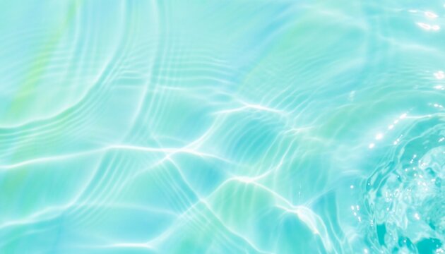 Aqua water ripple texture with dancing sunlight reflections.