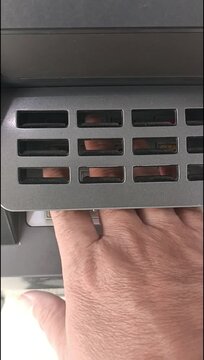 Close-up of human finger pressing ATM keypad button. Banking transaction in progress, financial technology interface, secure PIN entry, cash withdrawal machine, customer using automated teller service