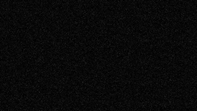 Flickering Screen Distortion Atmospheric Overlay. Dark Cinematic Black and Static Noise 4k Animation on Black Background. Fine Film Dust Speckles, Vintage Analog Texture, Retro TV Interference video 
