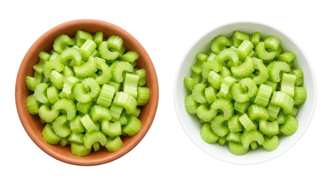 Fresh chopped celery in a clay bowl and a white ceramic bowl isolated on transparent background top view.