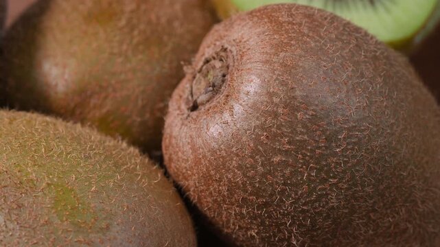 Fresh Kiwi Fruits in Wooden Bowl