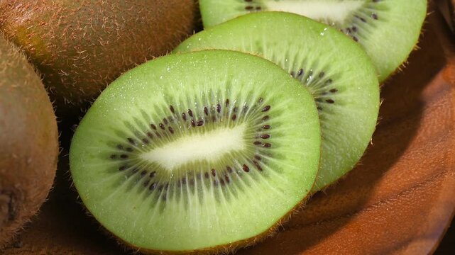 Fresh Kiwi Fruits in Wooden Bowl