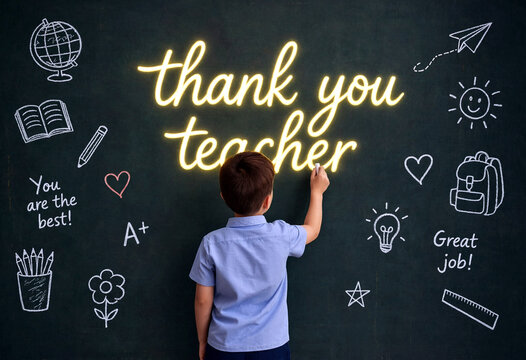 Young student writing thank you teacher message on a chalkboard with educational drawings around