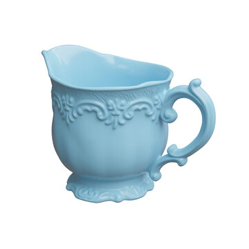 An ornate light blue ceramic cream pitcher with a curved handle, scalloped rim, and embossed flourishes, isolated on white transparent