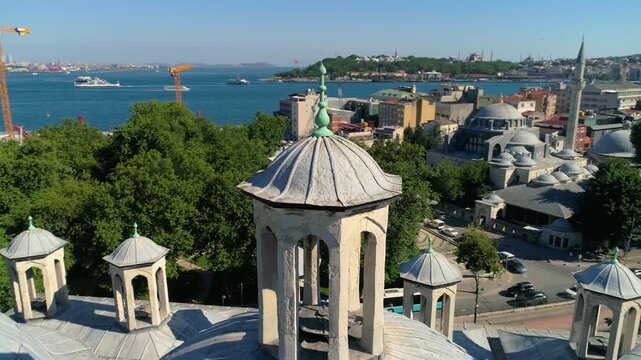 Beyoglu, Istanbul, Turkey - 30 June 2026: Aerial view of Tophane-i Amire Culture and Art Center with its historic domes overlooking the Bosphorus and city skyline.