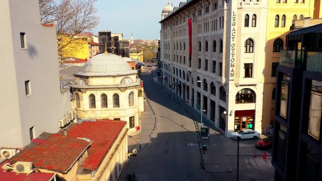 Fatih, Istanbul, Turkiye - 30 June 2026: Aerial view of Eminonu showing historic buildings, narrow streets, and the Legacy Ottoman Hotel.