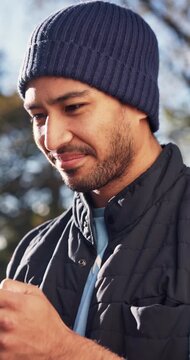 Texting, confused and man in park with phone, miscommunication and surprise message on chat app. Digital, bokeh and person outdoor with tech, networking issue and unclear response on virtual platform