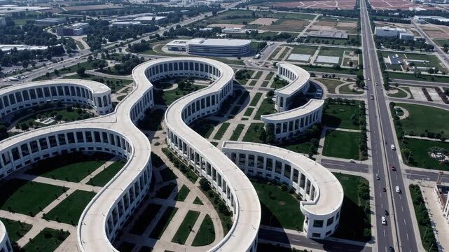 Aerial View of Modern Curved White Architecture Complex and Highway