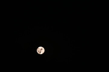 moon in the night sky, Bright full moon shining in a clear night sky. © Petra