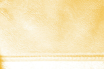 Distressed Golden Velvet Fabric Texture Overlay with Soft Plush Surface. Perfect for Luxury Backgrounds, Textile Design, Branding, Upholstery, Fashion, and Decorative Artwork. © ZackZephyr
