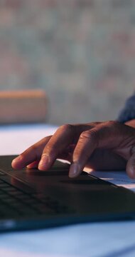 Construction site, man and hands scroll on laptop for progress report, building code and RFI email. Architecture, employee and tech review for zoning compliance, online blueprint and risk assessment