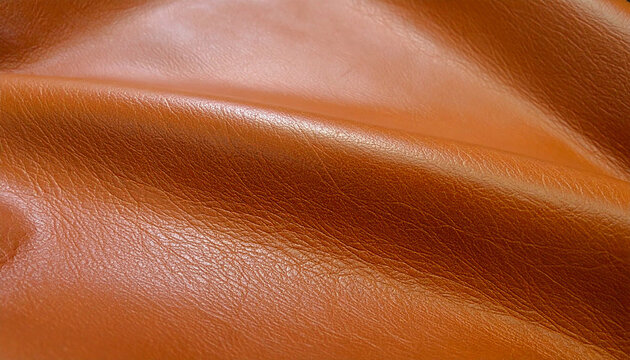 Rich brown leather with soft natural surface texture, subtle grain patterns and delicate variations in warm chocolate and caramel tones, elegant premium material backdrop.