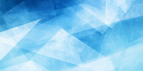Obraz premium Abstract blue geometric background with overlapping translucent triangular shapes creating a sense of depth and motion.