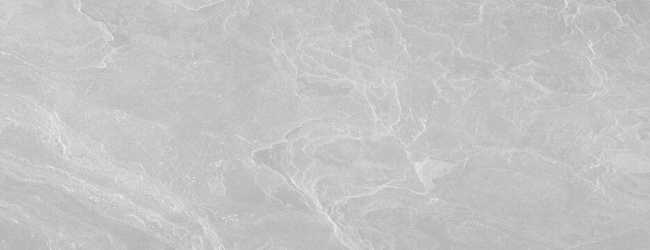 Light gray marble texture with soft white veining and natural stone details. Elegant surface for ceramic tiles, flooring, walls, and interior design.