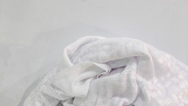 White Bath Towel Folded On Soft Fabric Surface Minimal Household Linen Concept