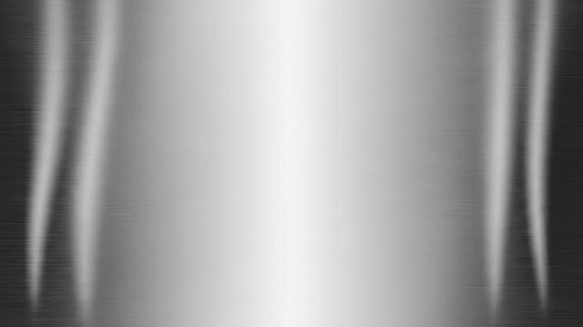 Brushed stainless steel metal surface with subtle light reflections