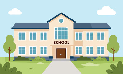 Fototapeta premium Traditional two-story school building with a classic entrance, surrounded by green lawns and trees on a sunny day.