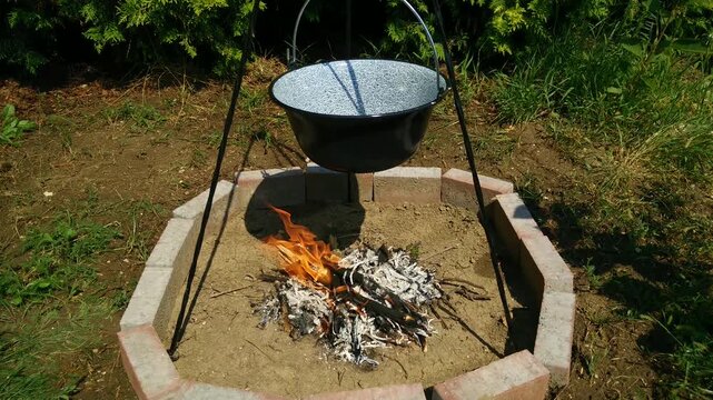 4K Outdoor Cooking by Open Fire in the Summer