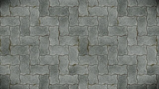 Gray interlocking paving stones form a textured seamless loop pattern background.