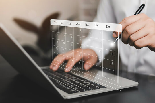 Business professional managing digital calendar schedule on laptop with virtual planner interface for appointment booking, meeting planning, task management, time organization, productivity, workflow.