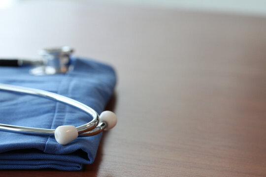Stethoscope on Blue Medical Uniform With Copy Space