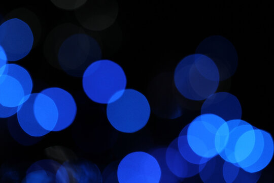 Blue Abstract Bokeh Lights on Black Background