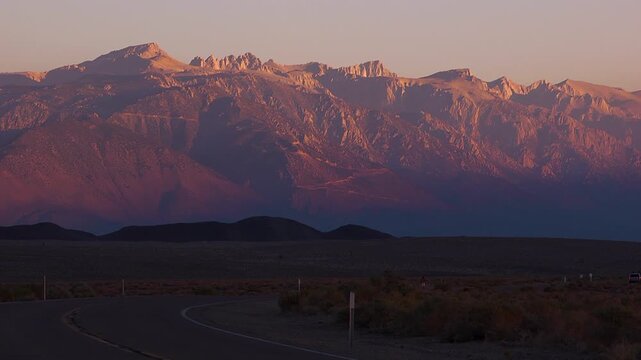 Wide shot of orange sunrise in death valley