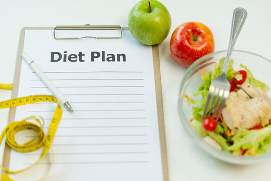 Diet and dieting. diet plan and check calories for healthy food. weight loss, lose, balance, control, reduce fat, low calories, routines, exercise, body shape, healthy foods.