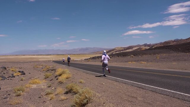 Wide shot of runners doing the badwater marathon