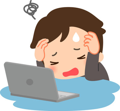 デスクで頭を抱えている若いビジネスマン