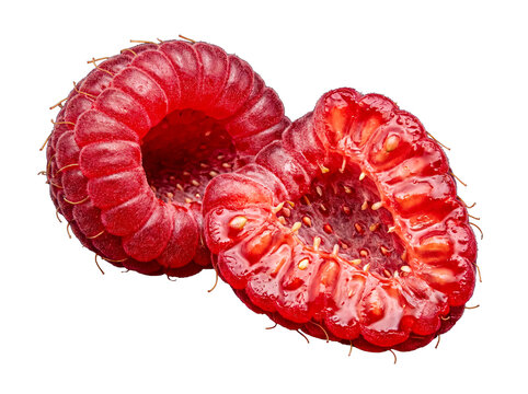 Vibrant red raspberry halves, showcasing intricate texture and juicy drupelets.