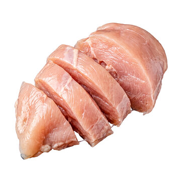 Dynamic photograph of raw chicken breast, partially sliced into pieces, viewed from an angle.