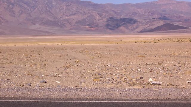 Woman running by in death valley