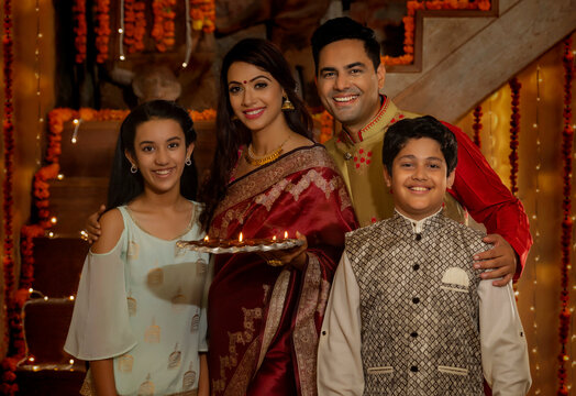 family celebrating diwali at home