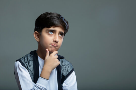Portrait of a young boy thinking (Children) 