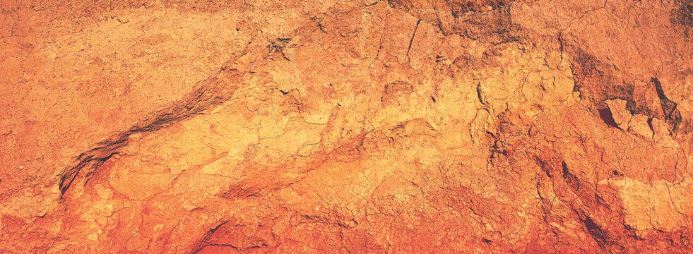 The texture of clay steep hill on the coast. Nature background