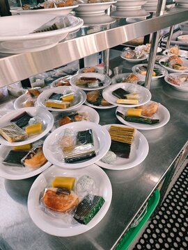 Traditional Indonesian Snacks and Kue on Plates at Local Coffee Shop, Banda Aceh
