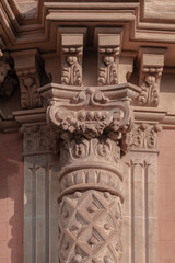 Elements of architectural decorations of buildings, columns and capitals, gypsum moldings, wall textures and patterns. On the streets in Catalonia, public places. © Kozlik_mozlik