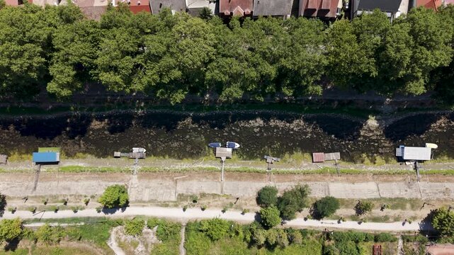 Top down drone tracking right above drought affected canal in Esztergom, Hungary