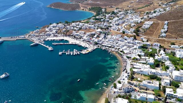 Aerial view of the town and port of Livadi at Serifos island, Cyclades, Greece, during a sunny summer day