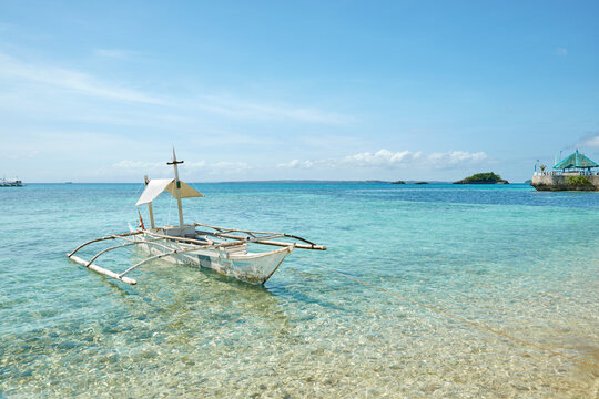 Bangka boat on the shore of Malapascua Island, Philippines.