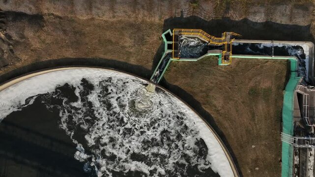 Aerial view wastewater treatment plant. Circular sedimentation tanks biological reactor, Water cleaning facility wastewater treatment plant, Recirculation solid contact clarifier sedimentation tank.