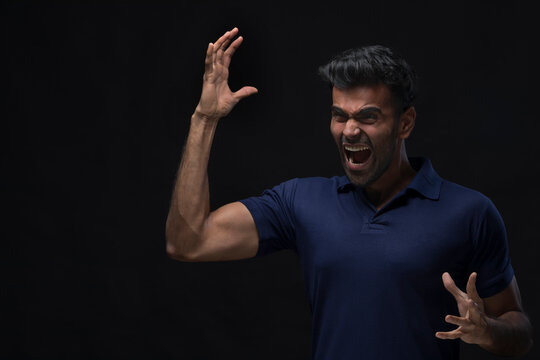 violent young man screaming