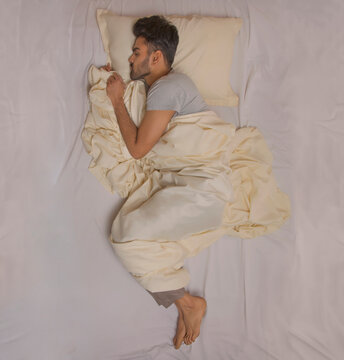 young man ssleep at home