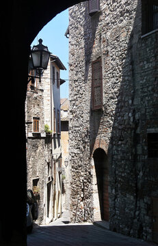 Ancient medieval architecture and historic stone alleyways in hilltop town of Narni in Umbria region, Italy