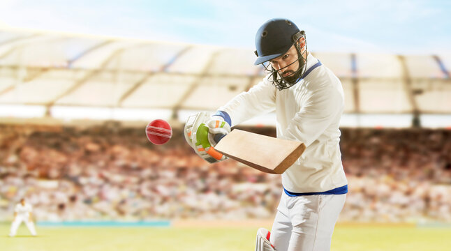 Batsman Hitting Ball During Cricket a Match In Stadium